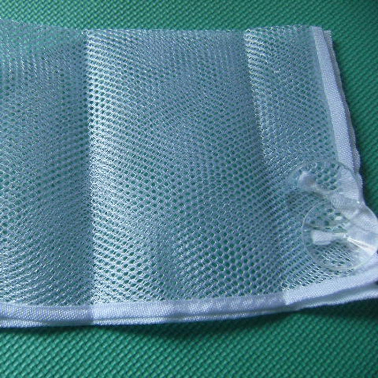 Blue mesh storage pocket insert for toy organizer, close-up fabric texture.