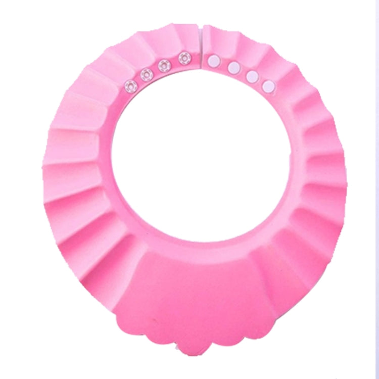 Pink circular kids shower cap with ruffled edge and face cutout, waterproof hair shield
