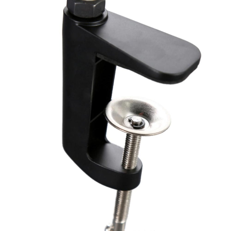 Black table clamp with circular suction base and metal screw for table attachment