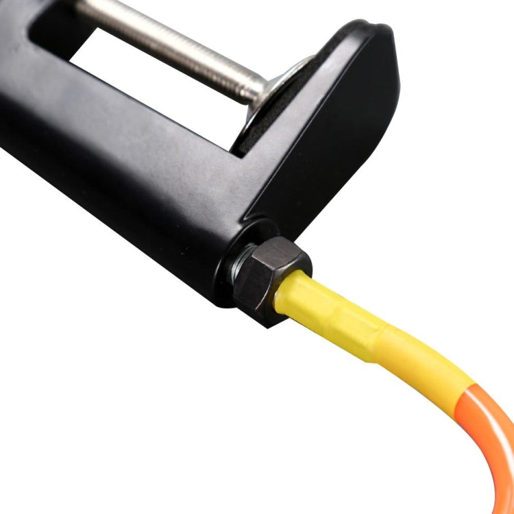 Launcher arm adjustment on black support with yellow-orange flexible hose