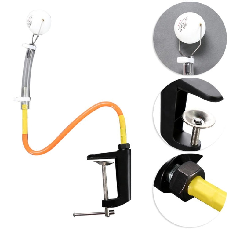 Table tennis serving launcher set with black clip, orange hose, and white ball holder