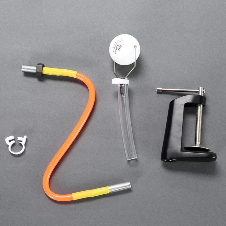 Table tennis training launcher set with suction disc, black clamp base, and orange hose