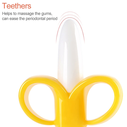 Close-up of yellow banana-shaped silicone teether toothbrush with white bristle top