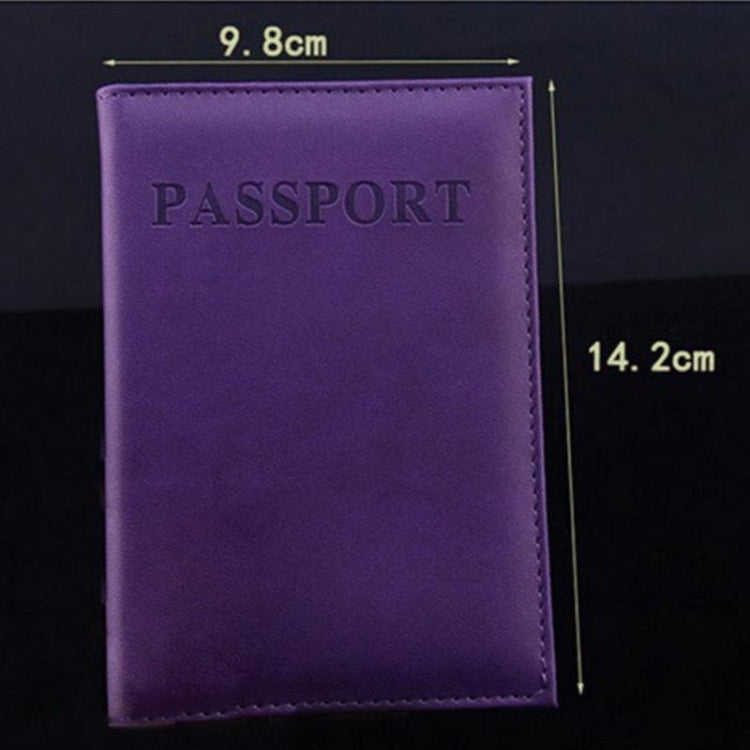 Purple faux leather passport travel cover with embossed PASSPORT title and top stitching