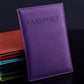 Artificial leather passport cover, purple with embossed PASSPORT and edge stitching