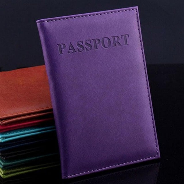 Artificial leather passport cover, purple with embossed PASSPORT and edge stitching