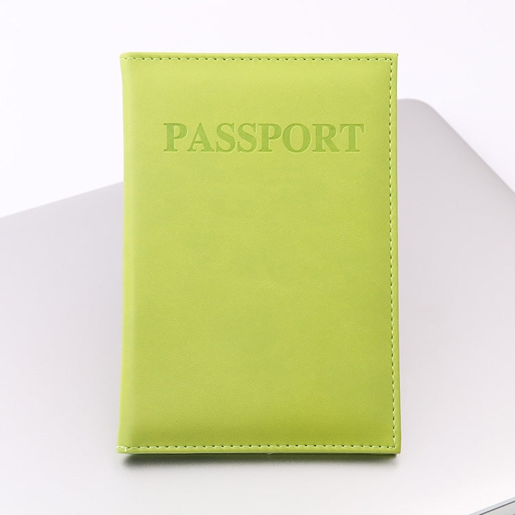 Artificial leather passport cover, lime green with embossed PASSPORT text and stitched border