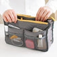 Gray waterproof folding travel bag with multiple mesh pocket organizers and zip top