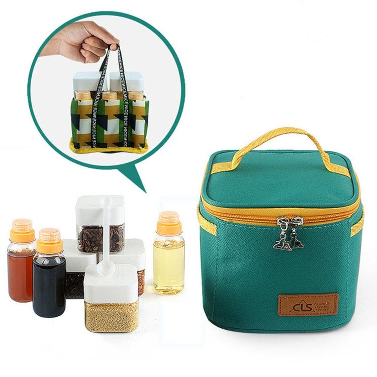 Teal lunchbox-style seasoning kit with yellow handle and zip, with condiment bottles.