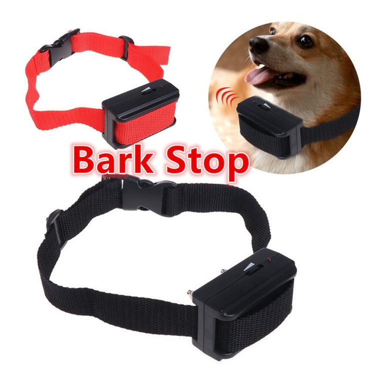 Retractable bark stop dog collar with black control box on red and black straps