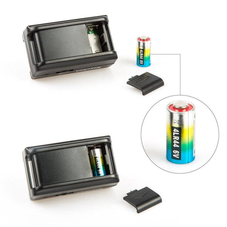Retractable bark stop collar control unit shown with internal battery compartment parts