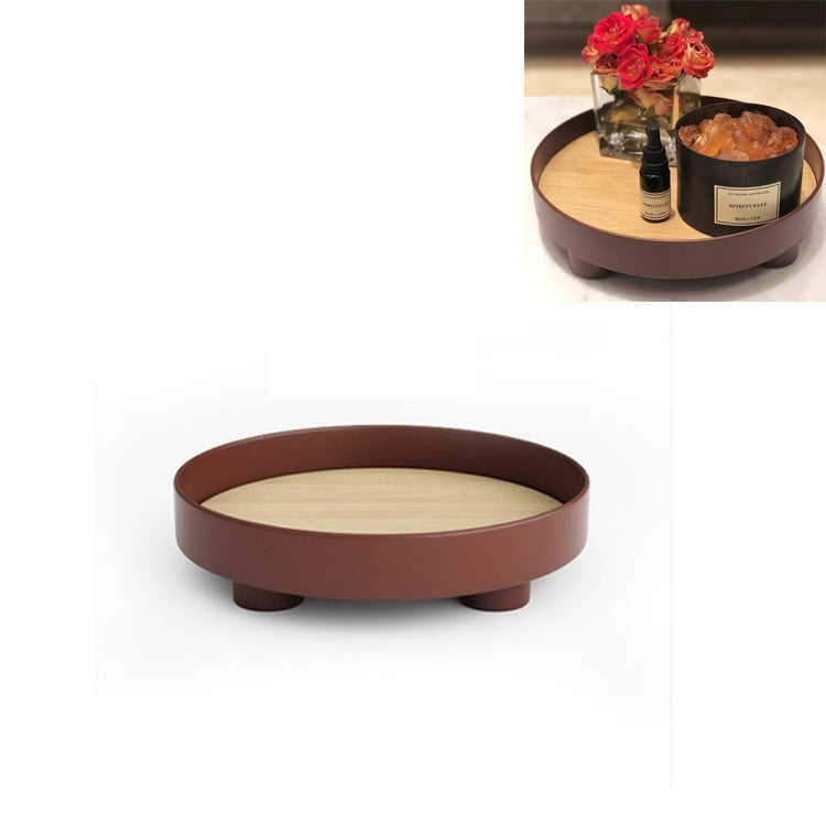 Round storage tray with beige insert, brown rim, and three raised feet