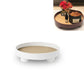 White round desktop storage tray with raised rim and small feet