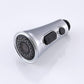 Stainless faucet sprayer nozzle end view with rubber spray face and pause button