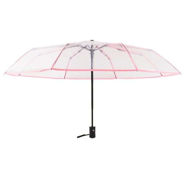 Pink transparent folding umbrella with 8 ribs and black automatic handle