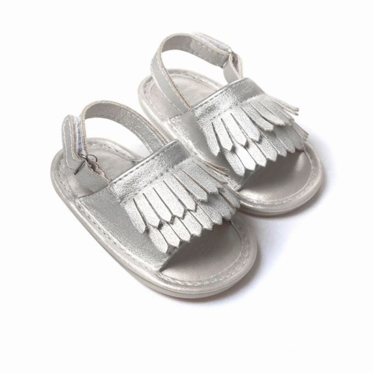 Silver fringed baby sandals with hook-and-loop ankle strap and open toe