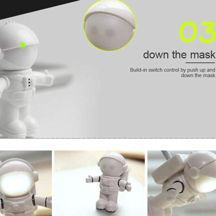 White astronaut LED desk lamp with push control on helmet mask