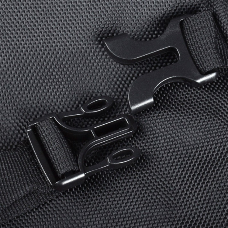 Black nylon strap hardware on motocross bag: buckles and D-ring connector