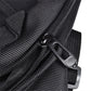 Close-up of black motocross bag zipper and metal pull with strap tab