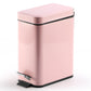 Pink small rectangular foot pedal trash can with hinged lid and black base trim