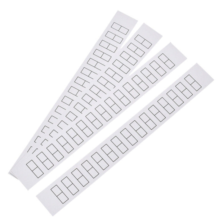White cross-stitch template sheets with rectangular grid hole designs
