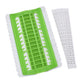 Green cross-stitch thread organizer tool with slotted grid and white template strip