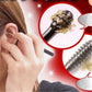 Ear cleaning tools set with one tool brushing a person’s ear; close-up