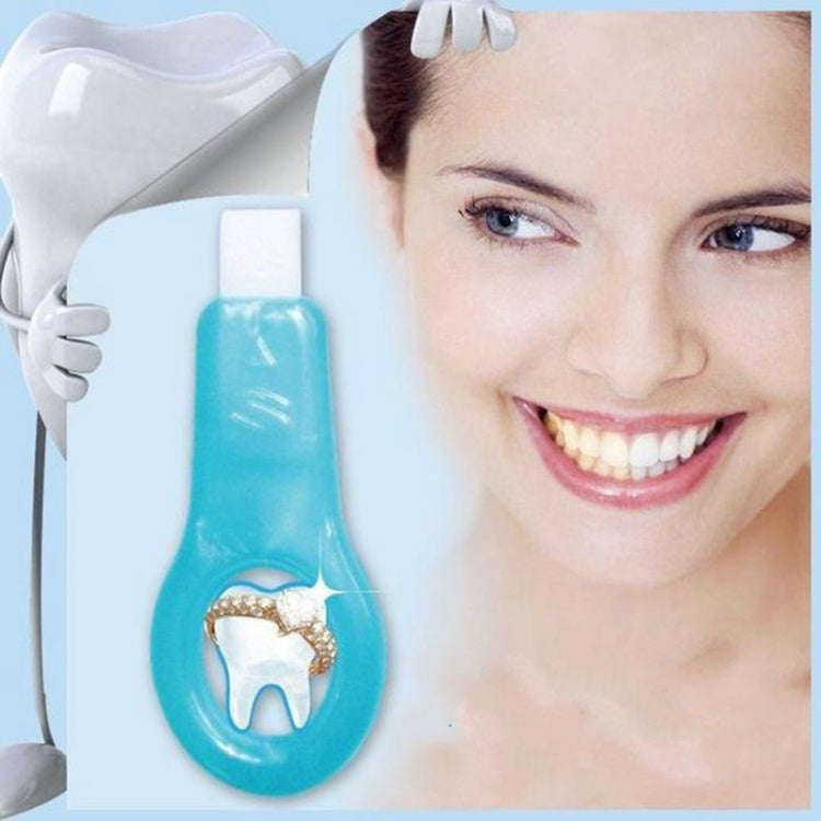 Blue oral cleansing device with white head held beside a smiling woman