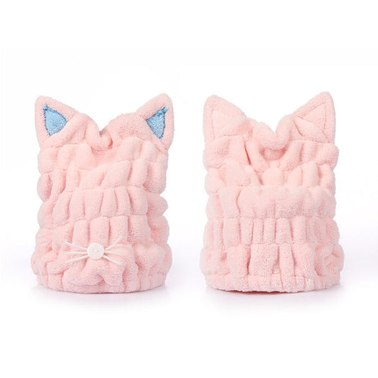 Pink cat-ear hair drying cap, two side views with blue ear lining and button tie