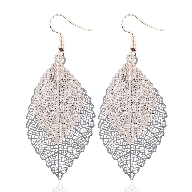 Silver-toned double-layer leaf earrings with filigree teardrop design