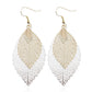 Cream-white double-layer leaf earrings with filigree teardrop design