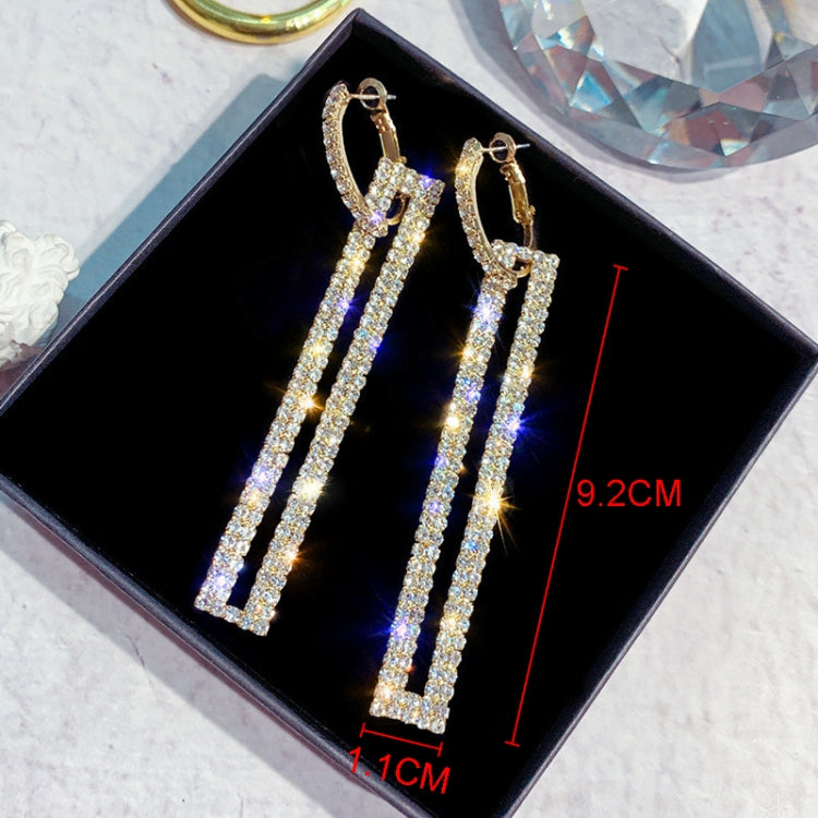 Gold rhinestone long rectangle drop earrings in a gift box with hoop-style hooks