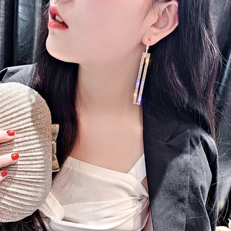 Blue rhinestone long rectangle drop earrings with silver-tone hook and sparkle