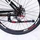 Bicycle kickstand mounted to frame with black arms and red release button
