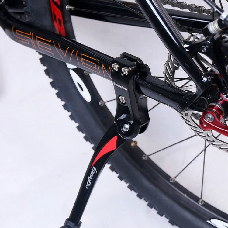 Bicycle kickstand mounting bracket with black alloy arms and red release button