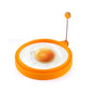 Orange round silicone egg ring mold with metal handle, holding a fried egg center.