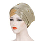 Beige and gold-tone beaded turban hat with draped fabric band and pearl studs