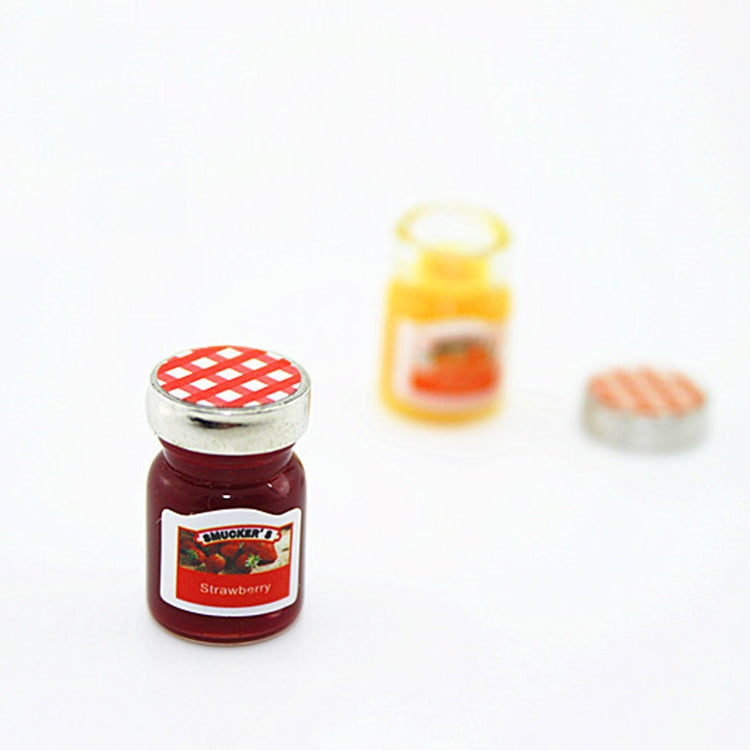 Mini strawberry jam jar with checkered lid, plus small spare lid and label plate