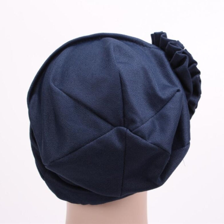 Women’s navy turban hat, back view with side rosette flower detail