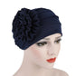 Women’s navy turban hat with side rosette flower detail, adjustable fit