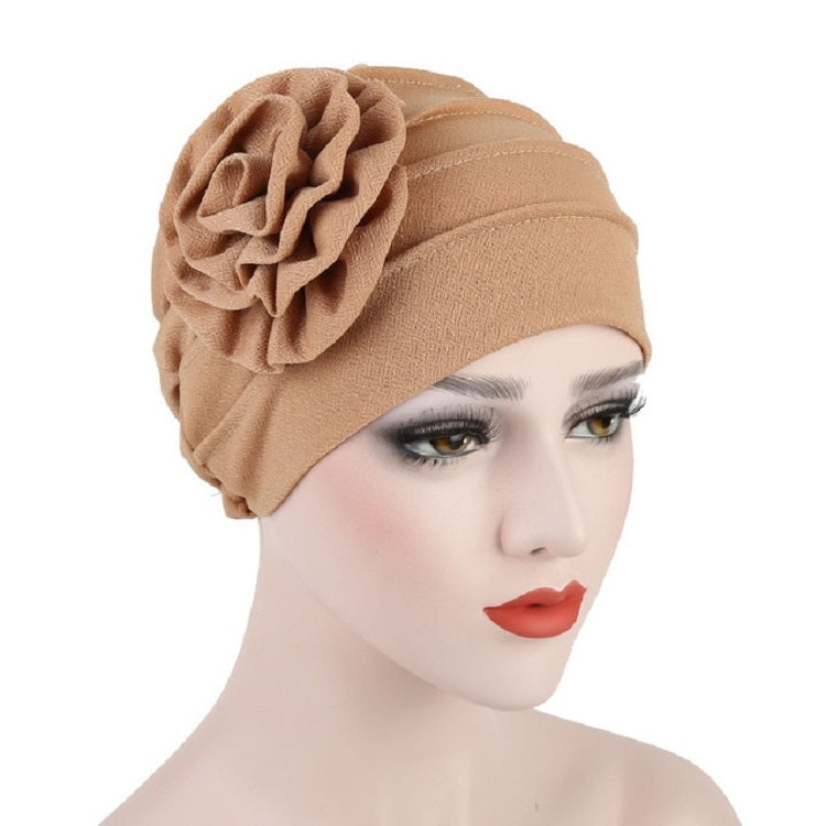 Women’s khaki/beige turban hat with side rosette flower detail, adjustable fit