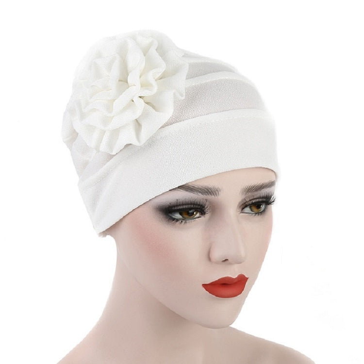 Women’s white turban hat with side rosette flower detail, adjustable fit