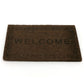 Brown dollhouse welcome floor mat with 'WELCOME' text and Greek-key border