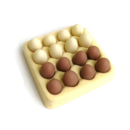 Mini egg carton toy with 16 molded eggs, yellow tray with white and brown egg pieces