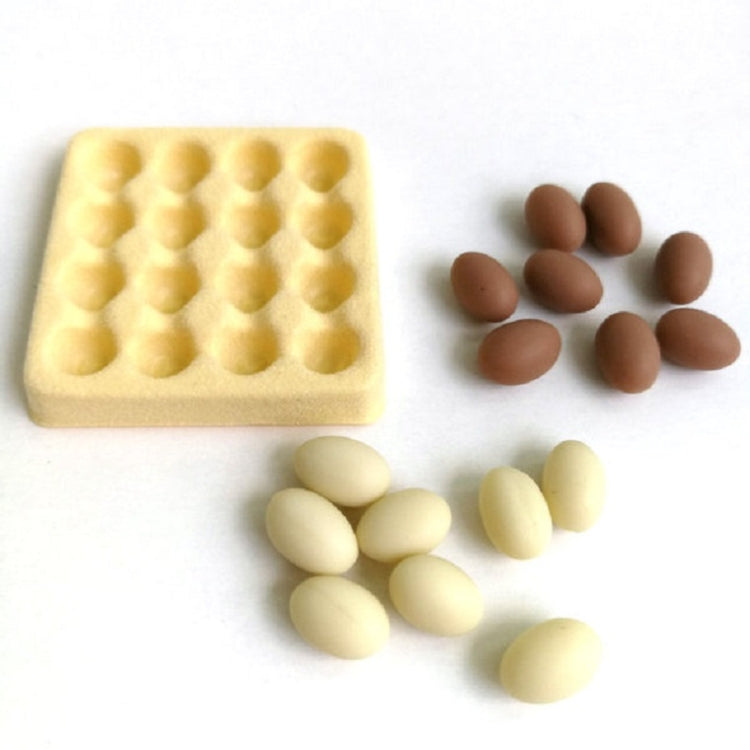 Mini egg carton with molded cavities and 16 loose molded eggs, yellow tray with white and brown