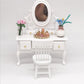 White doll dressing table with mirror, chair, and mini cosmetic set on top