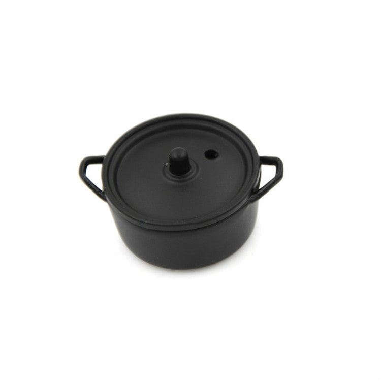 Miniature black alloy cooking pot with lid, side handles, and central lid knob