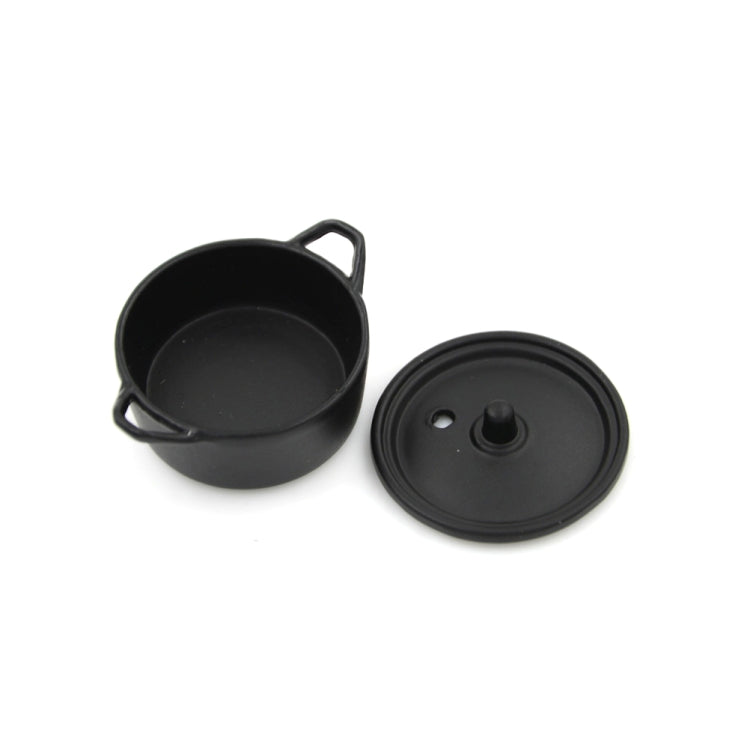 Miniature black alloy pot and matching black lid, with side handles and knob