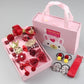 Girls hair accessories set in red box with bows, pom-pom bands, and hair ties