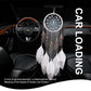 Center-hanging dreamcatcher with silver web and white glitter-tipped feather tassels